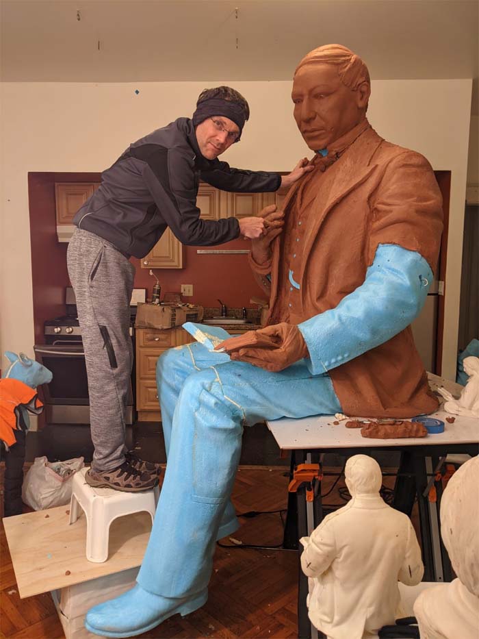 Ethan Houser modeling laser enlargement of Benito Juarez monument